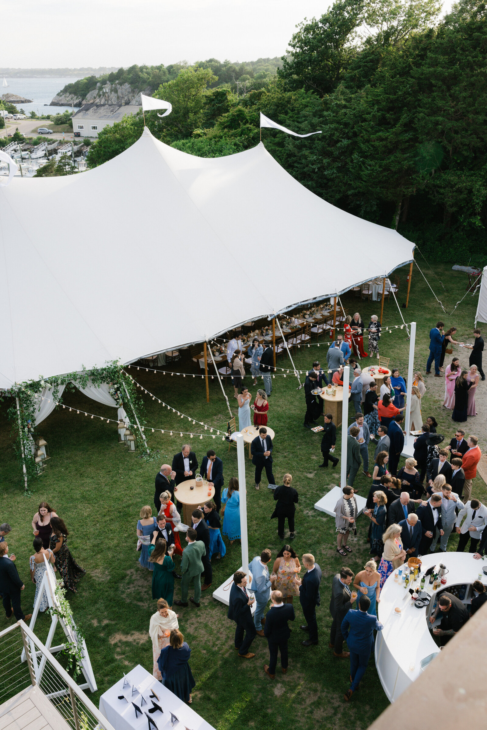 Coastal sailcloth celebration overlooking the harbor, Newport