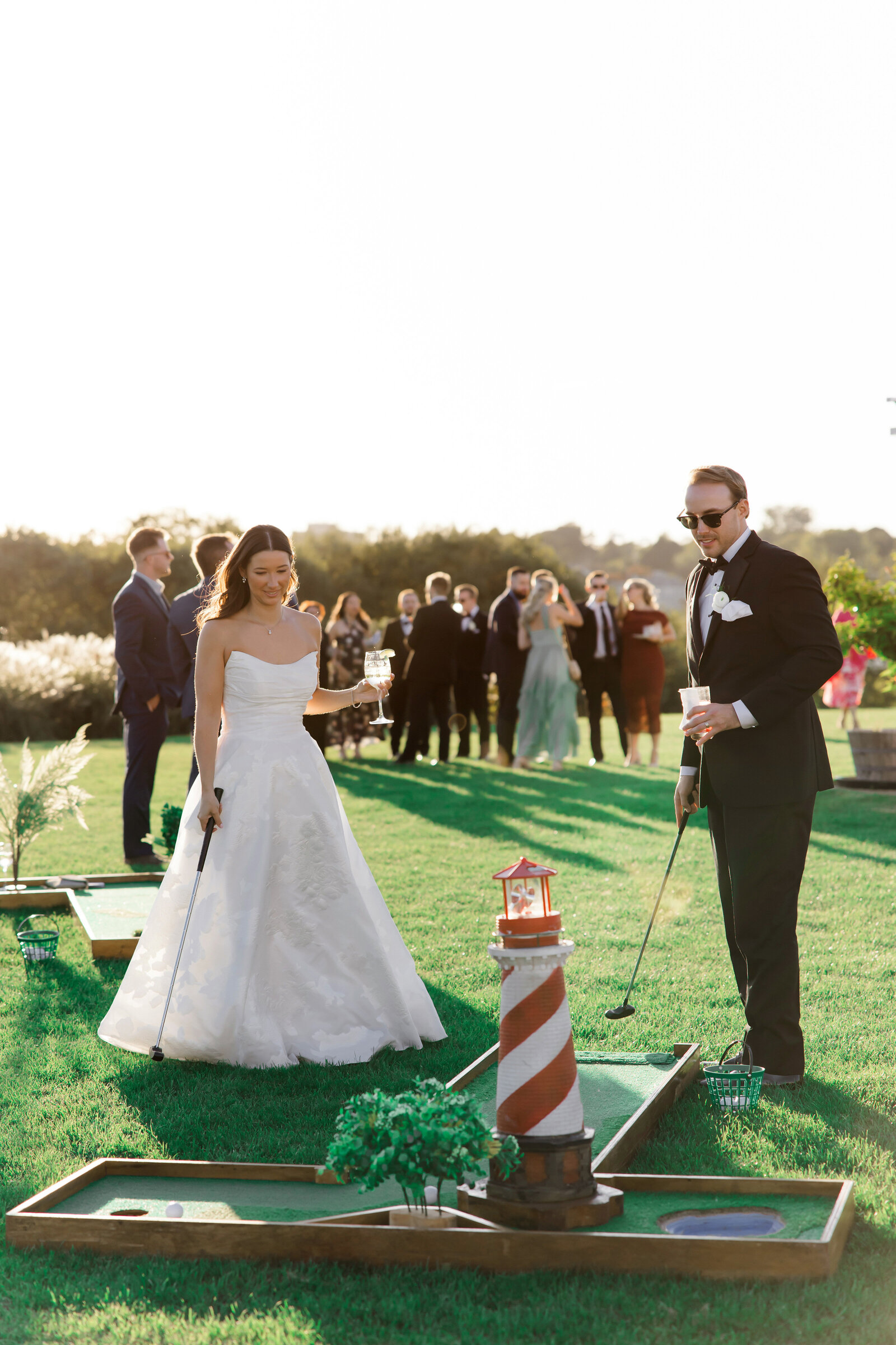 A playful cocktail-hour moment on the lawn